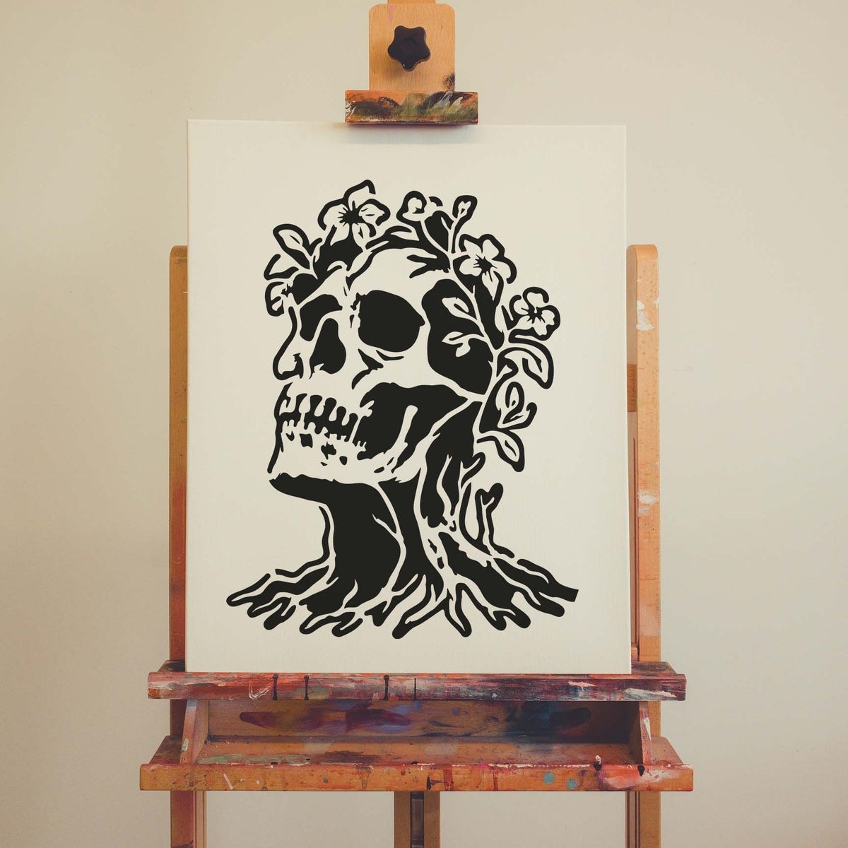 Rooted skull and blooming branches define the Floral Skull Tree Stencil on canvas