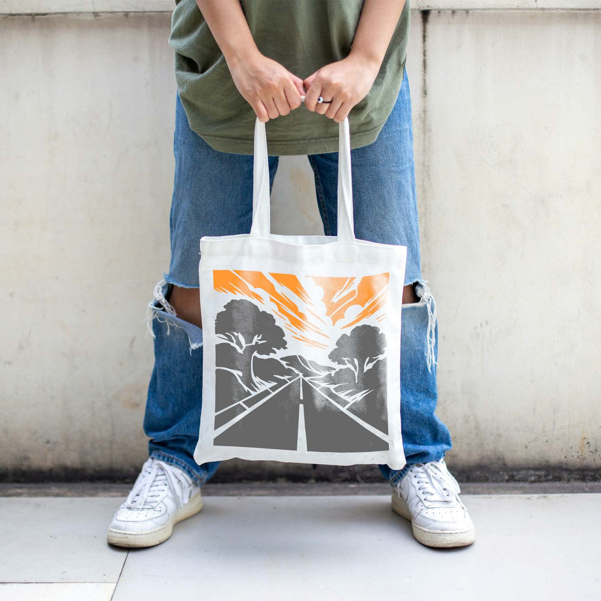Forest Highway Horizon stencil features a tree-lined road scene on a white tote bag