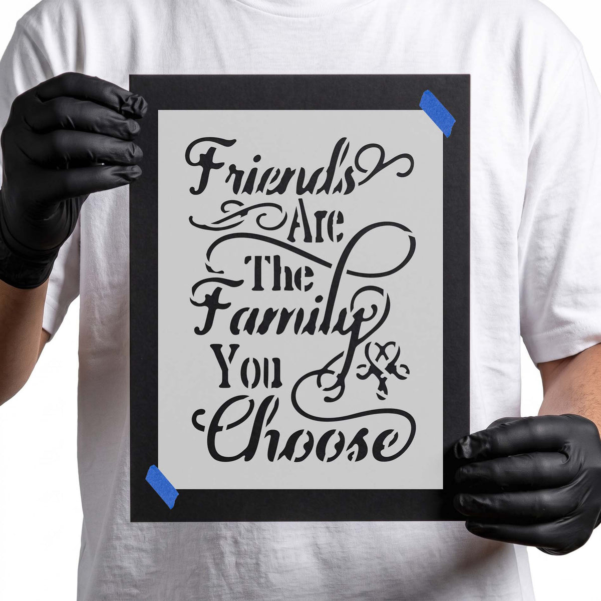 Friendship quote stencil with ornate cursive lettering and flowing decorative flourishes