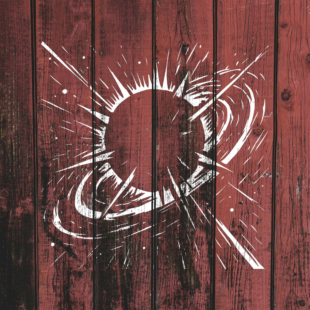 Against rustic red wood, the Galactic Solar Burst Stencil reveals a dramatic cosmic explosion