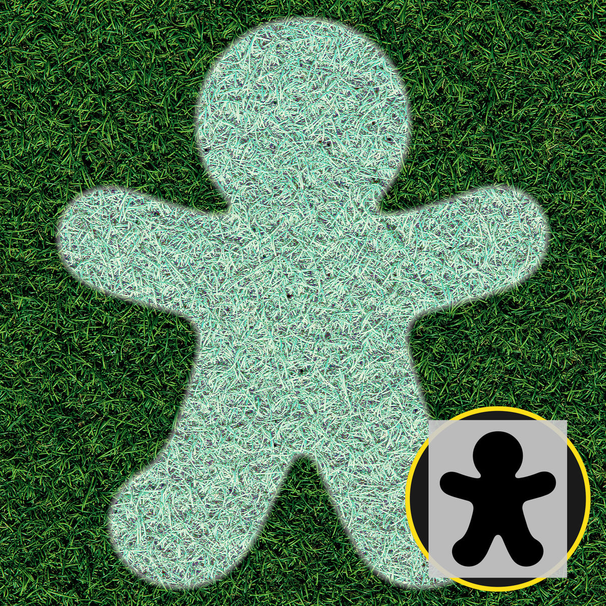Gingerbread man lawn stencil painted white on green grass