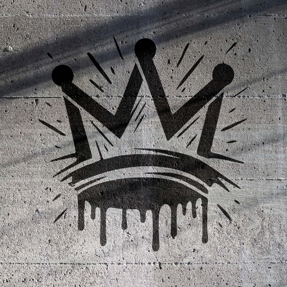 Sprayed on concrete, the Graffiti Crown Stencil shows a bold dripping crown with street-art flair.