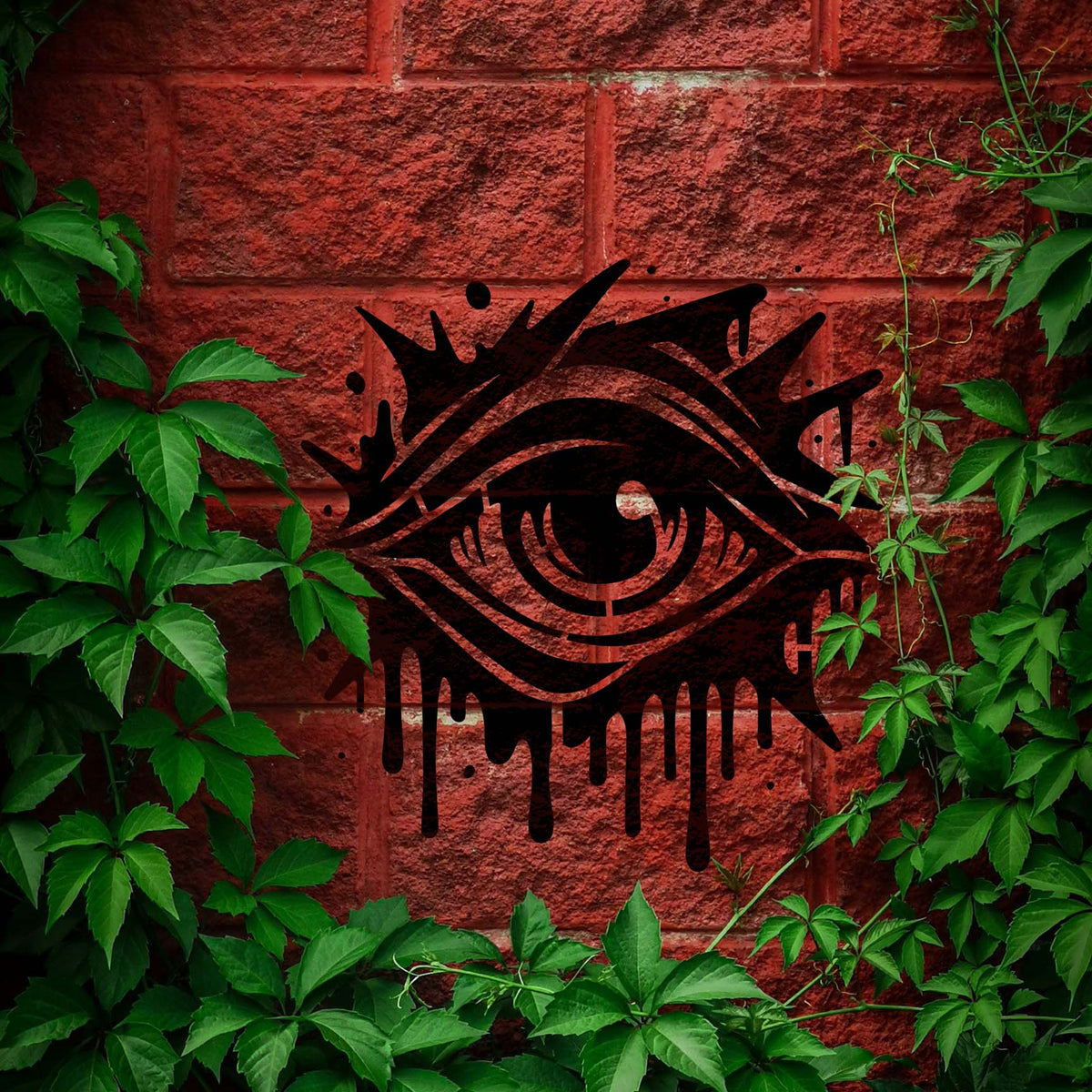 Bold Graffiti Eye Street Art Stencil sprayed on a red brick wall framed by green ivy.