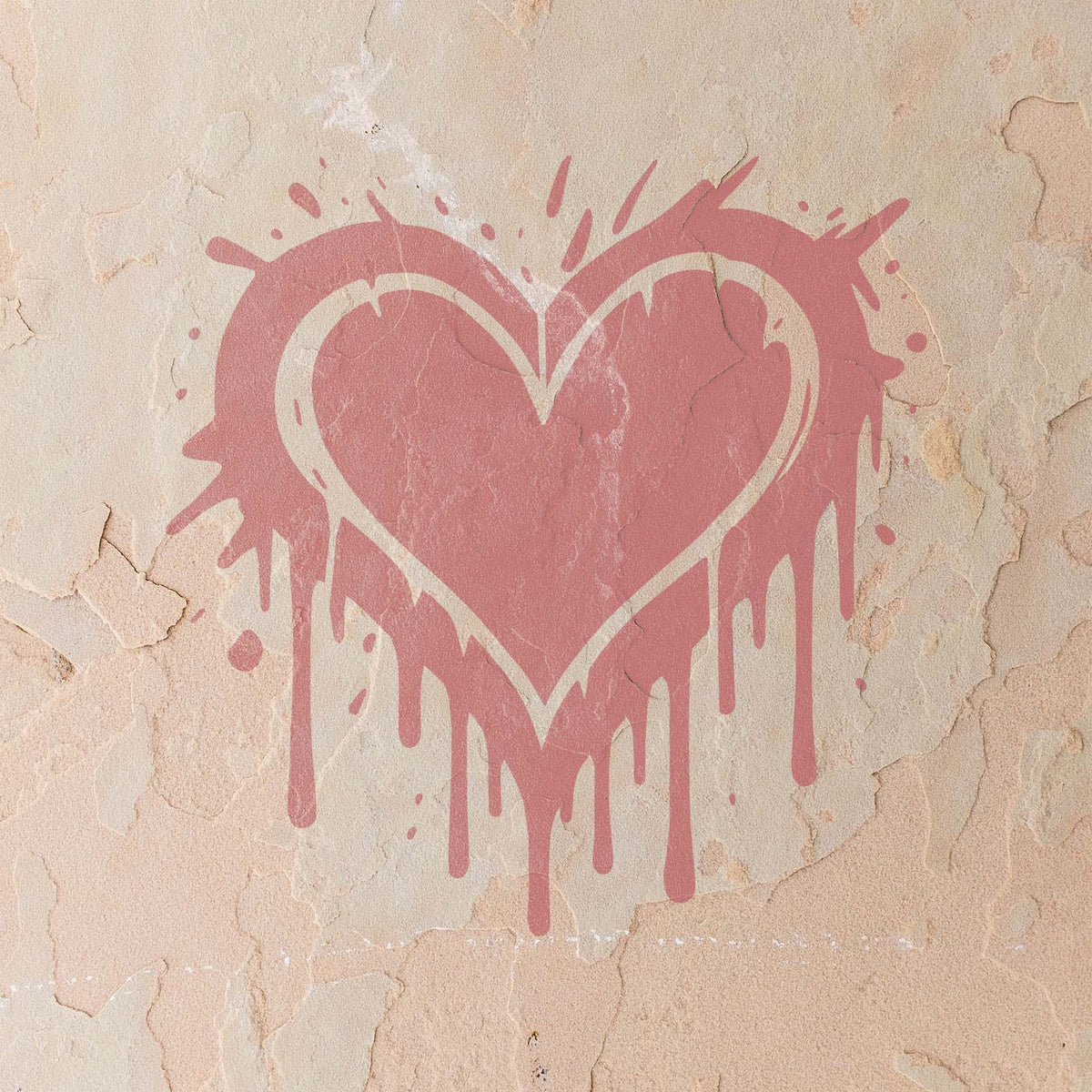 Against weathered stucco, the Graffiti Heart Drip Stencil reveals a dusty pink heart with flowing paint drips.