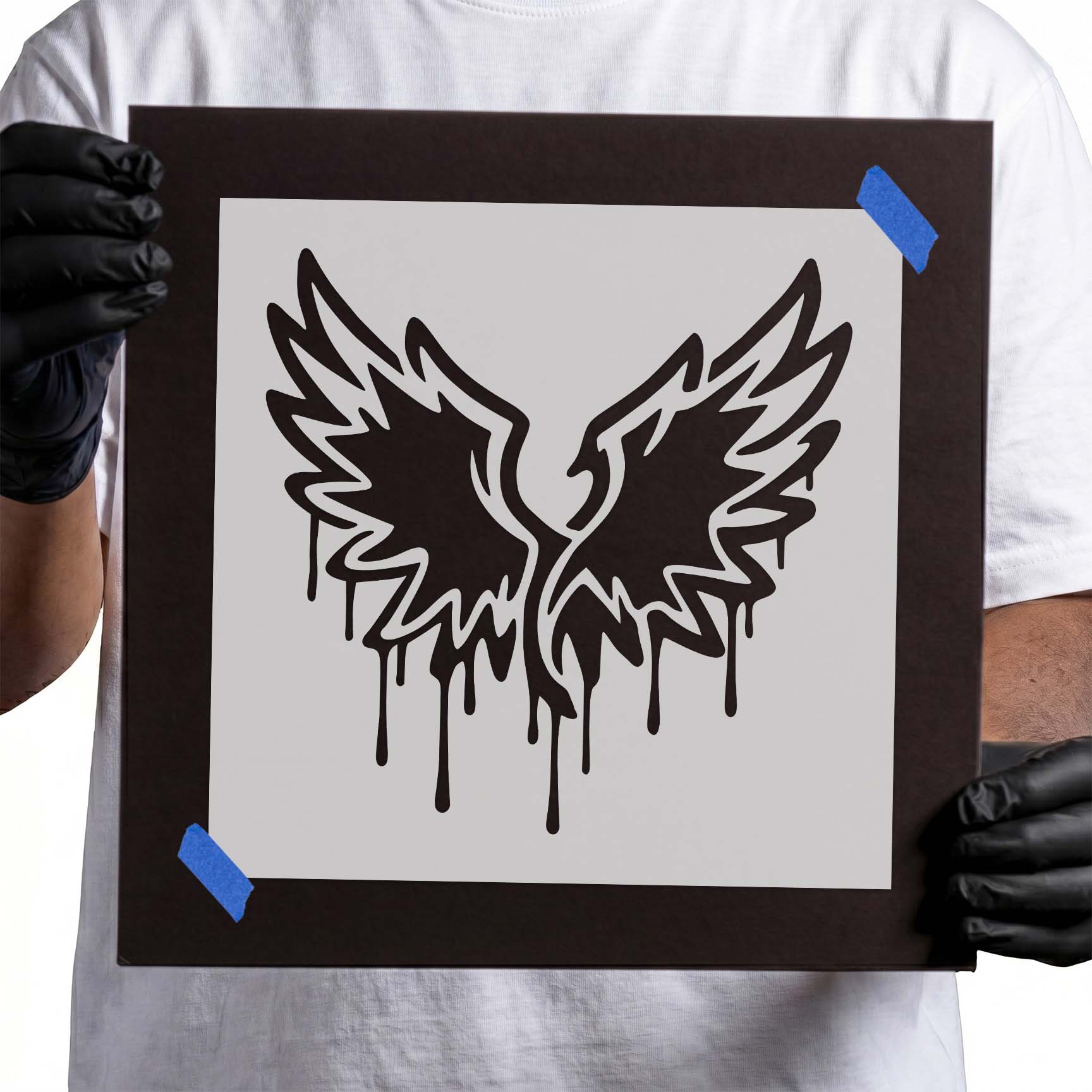 Graffiti Wings Stencil featuring distressed wings with dripping paint details.

