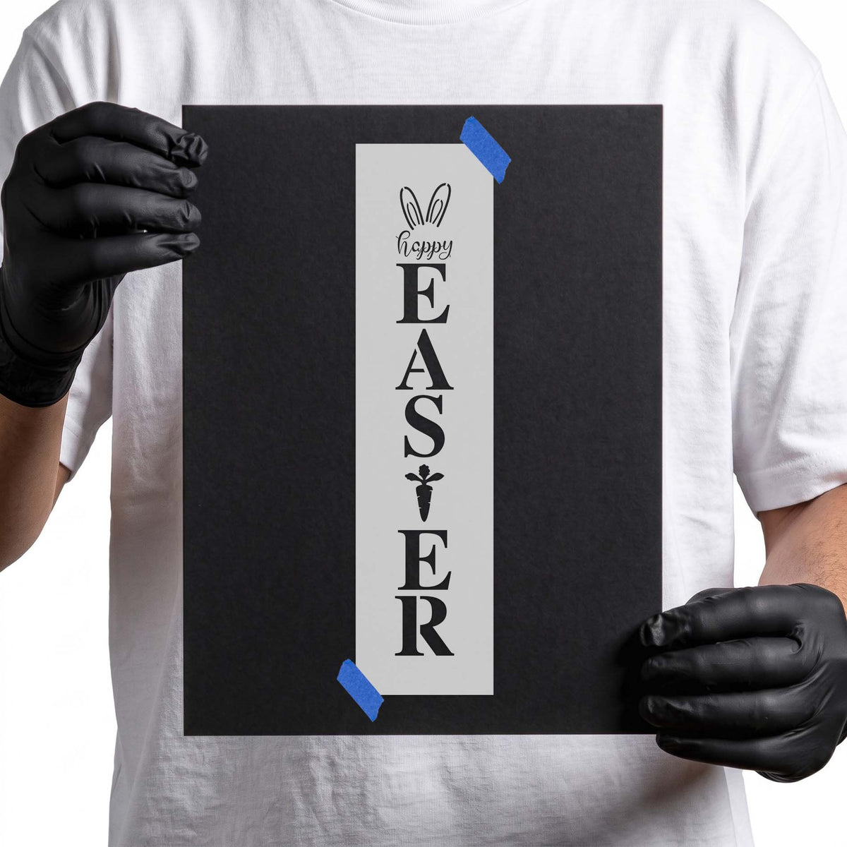 Vertical Happy Easter stencil with stacked letters, bunny ears, and carrot accent