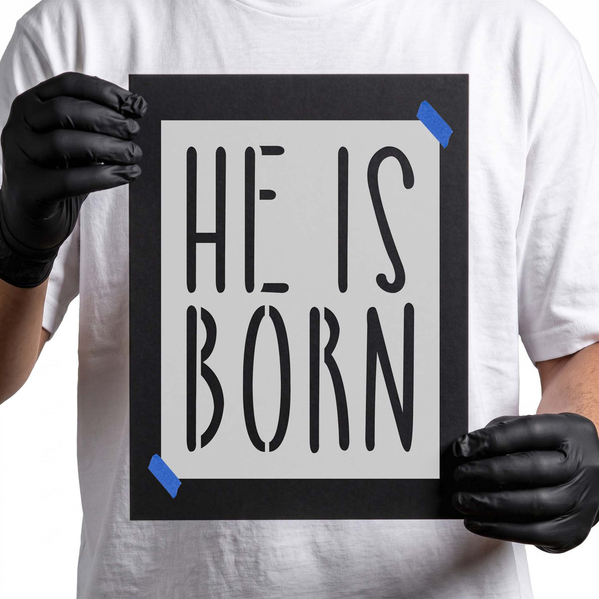 Bold He Is Born Stencil featuring tall two-line lettering in a clean minimalist layout