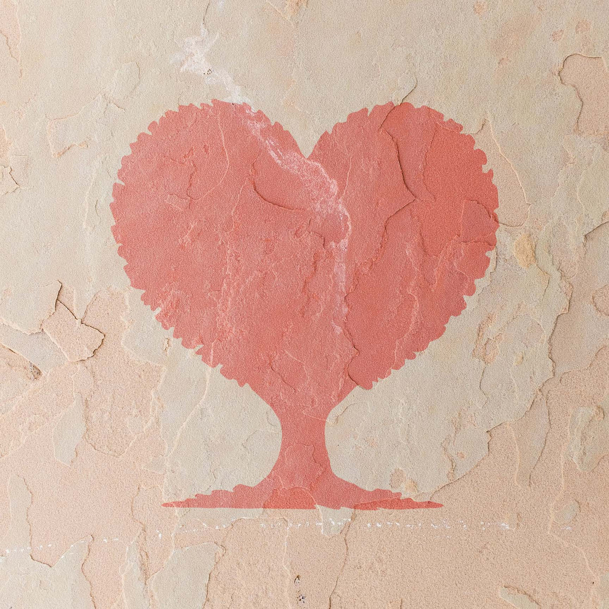 Heart Shaped Tree Silhouette stencil painted pink on a textured stucco wall