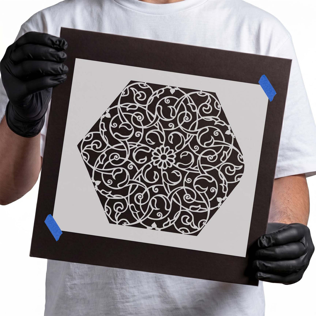 Hexagonal Floral Pattern Stencil with intricate curling vines, floral scrolls, and a central blossom