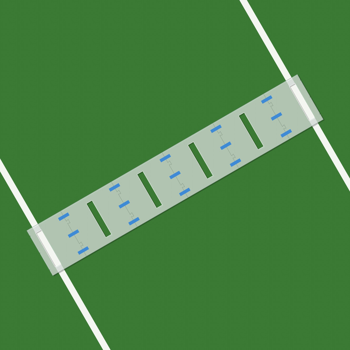 Modular football hash mark stencil assembled on turf over two 5-yard lines