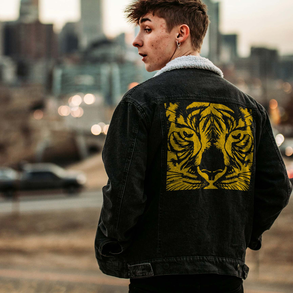 Intense Tiger Face stencil printed on the back of a denim jacket