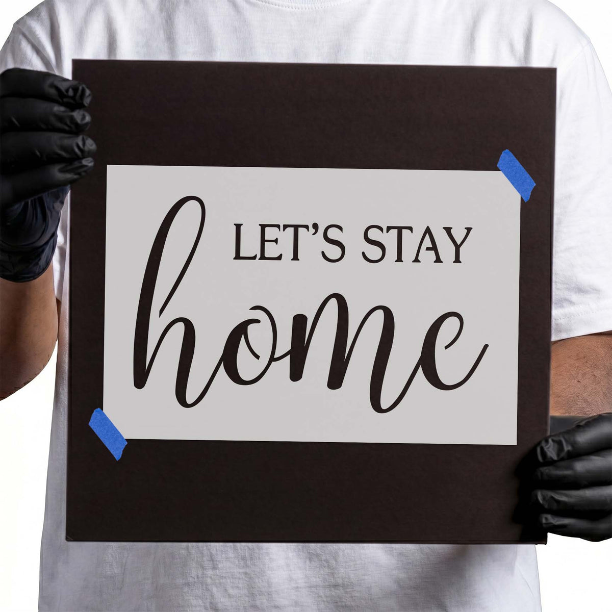 Let's Stay Home Stencil featuring uppercase serif text above oversized flowing cursive lettering