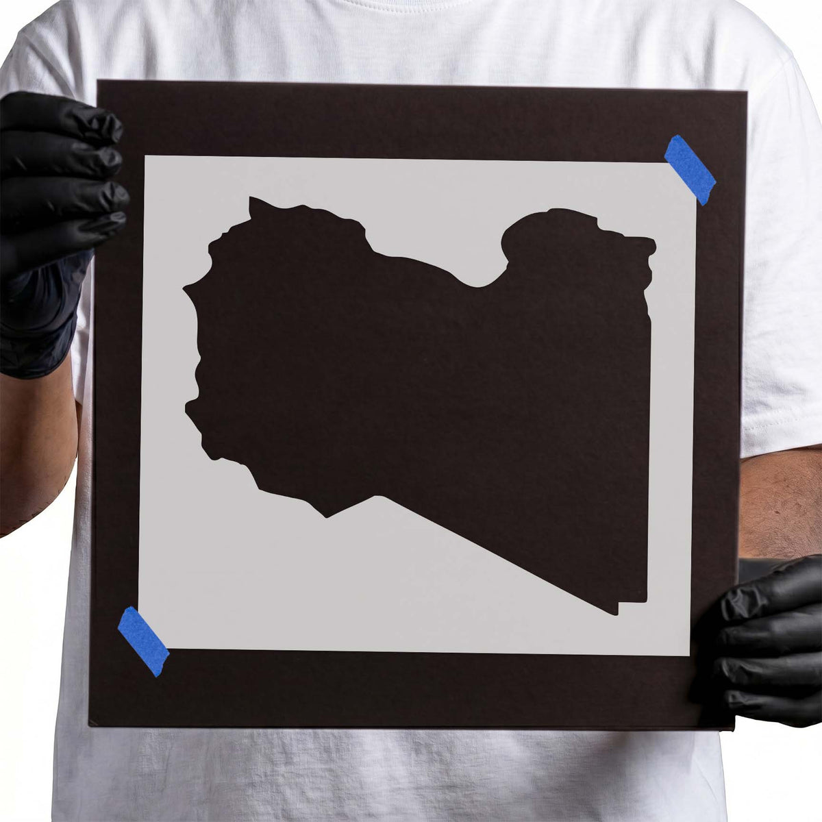 Libya stencil featuring a solid country silhouette with irregular northern coastline and angular borders