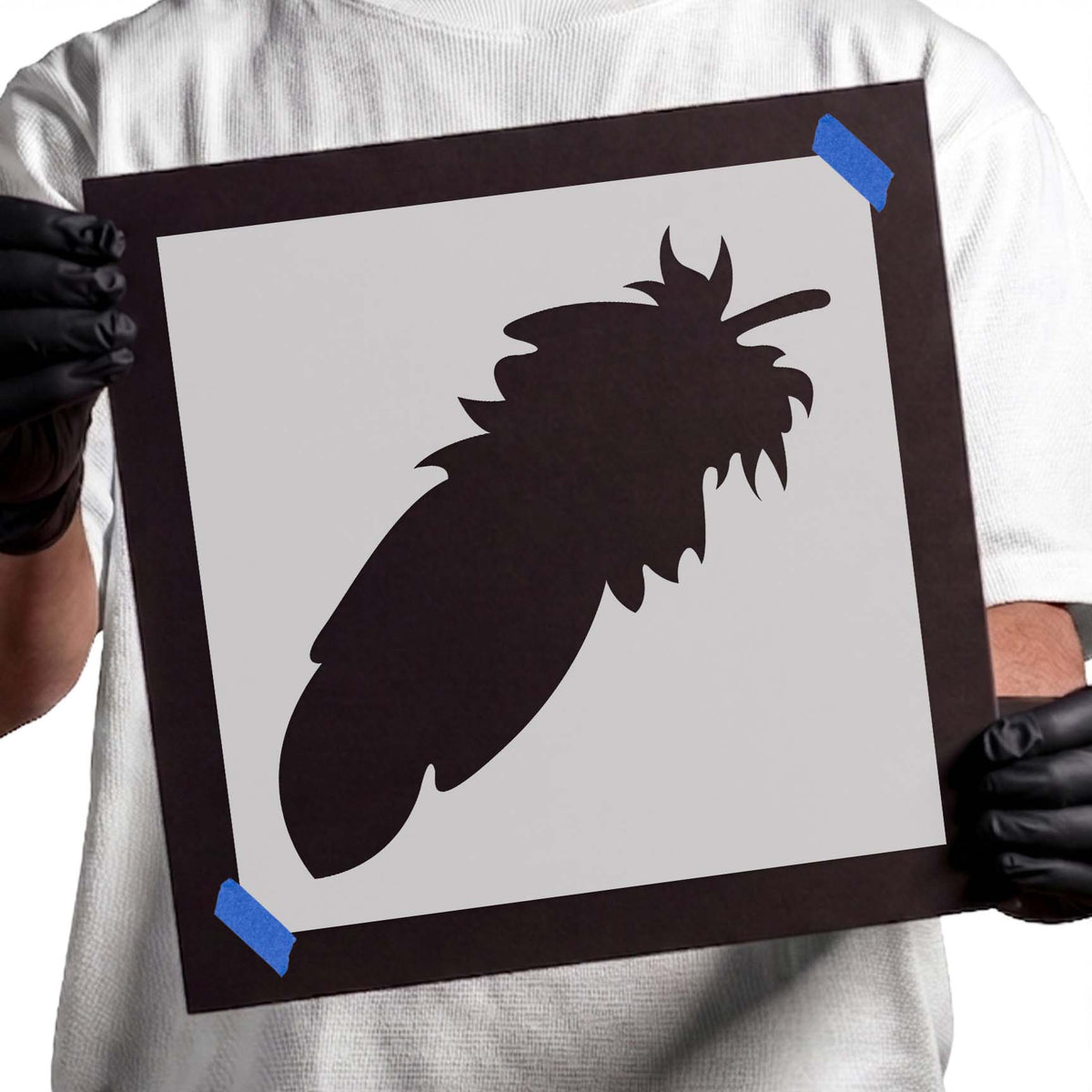 Long feather stencil with layered edges and a tufted top