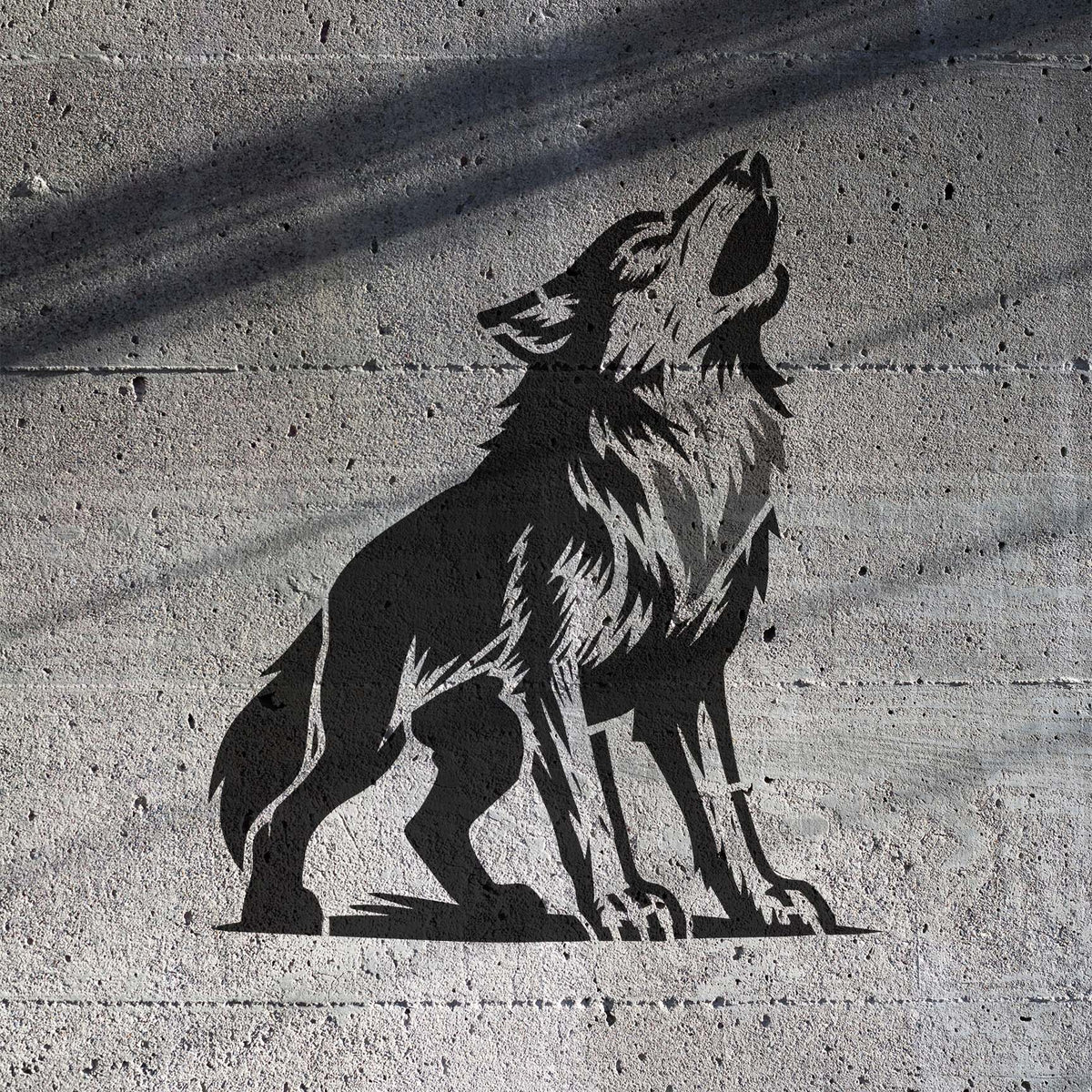 Majestic Howling Wolf Stencil painted in black on concrete wall