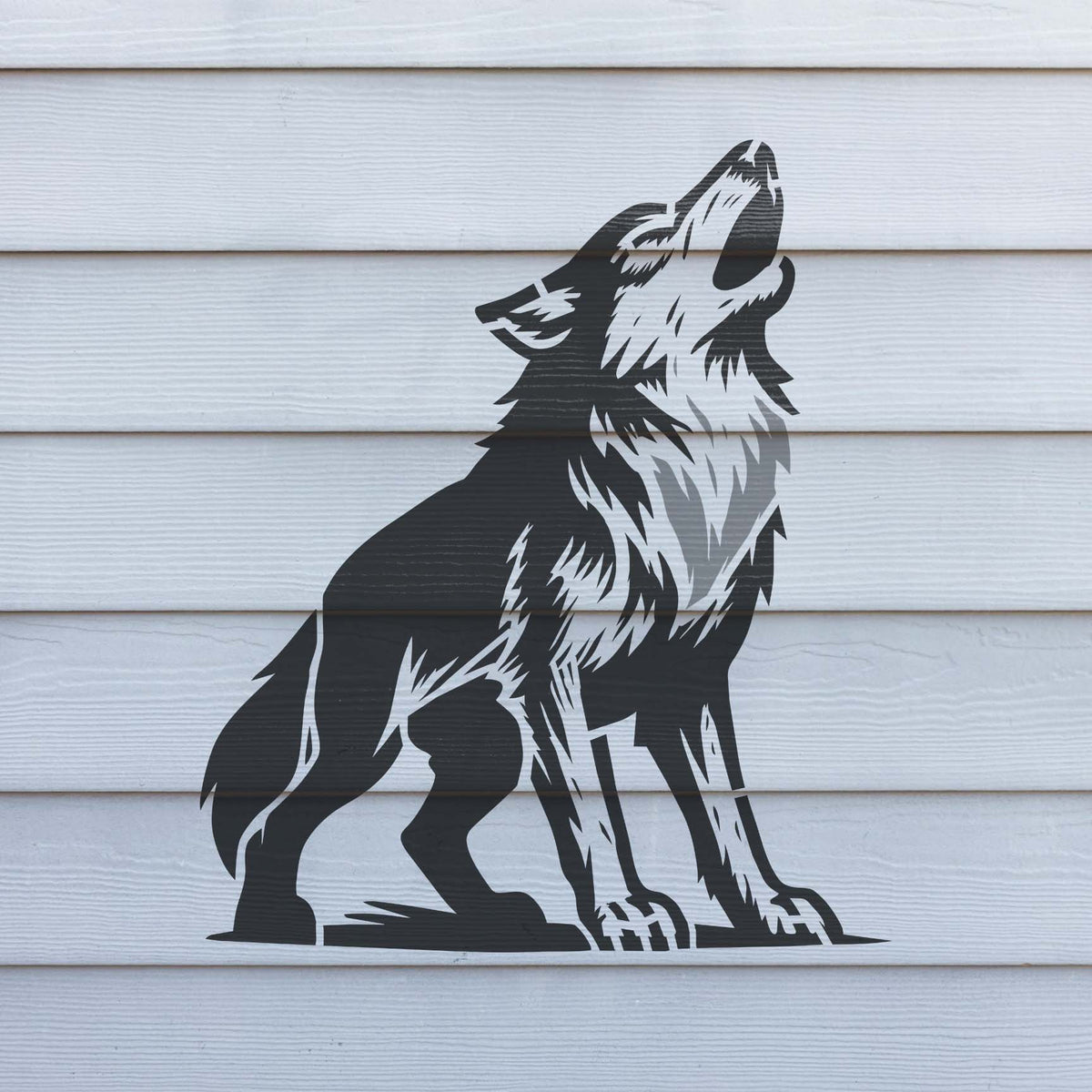 Majestic Howling Wolf Stencil painted in black on white siding