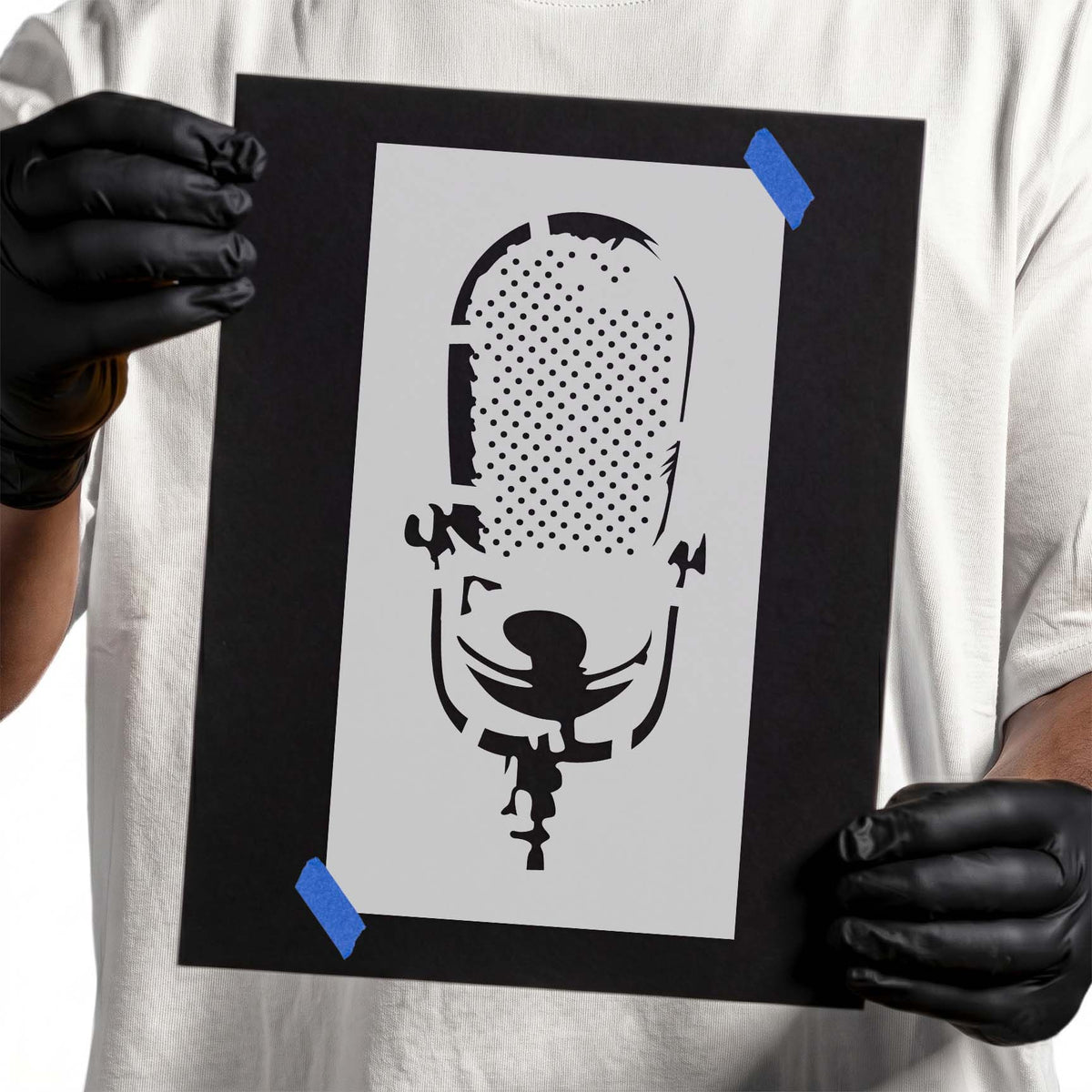 Vintage microphone stencil with perforated grille and detailed stand