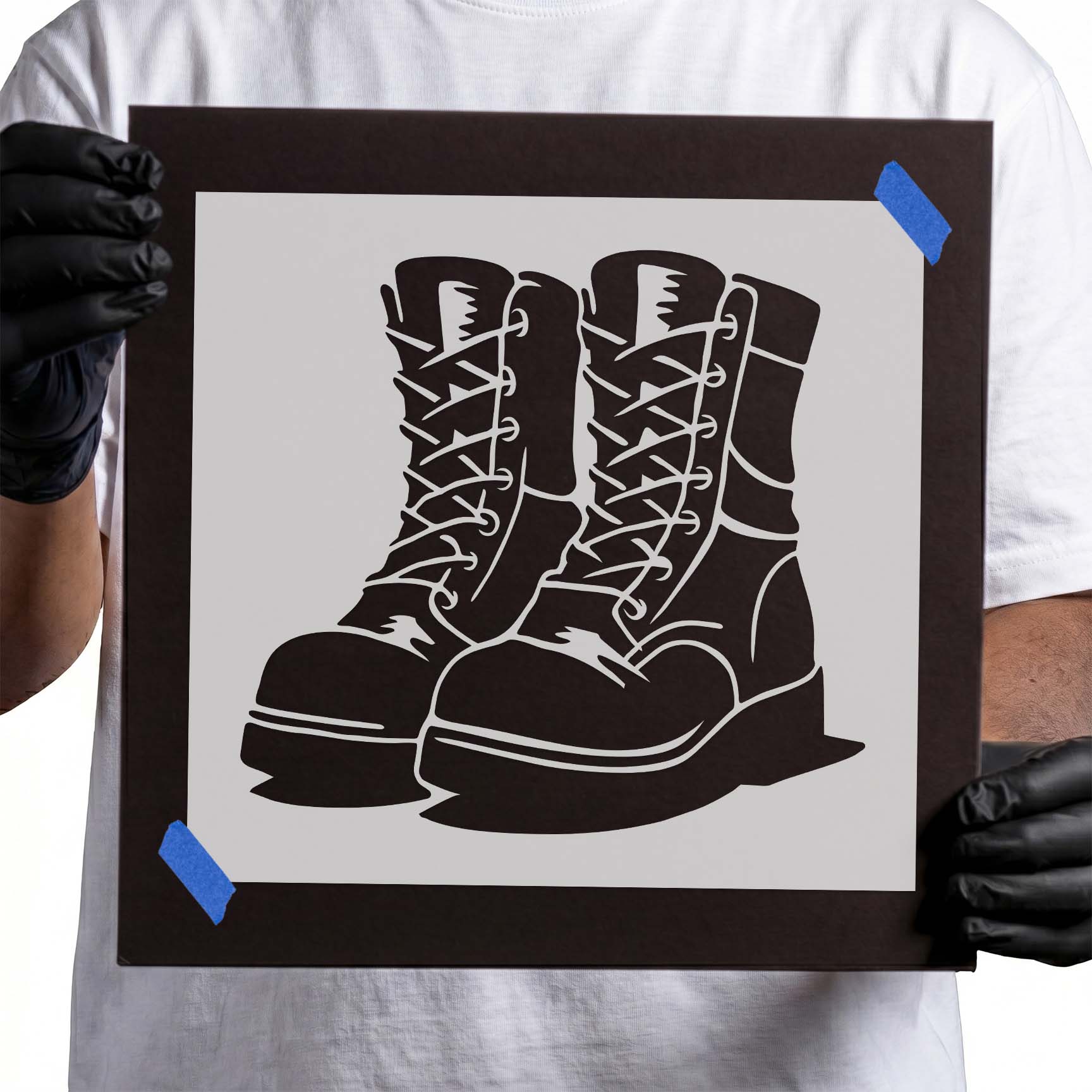 Pair of classic lace-up combat military boots with rugged tactical styling