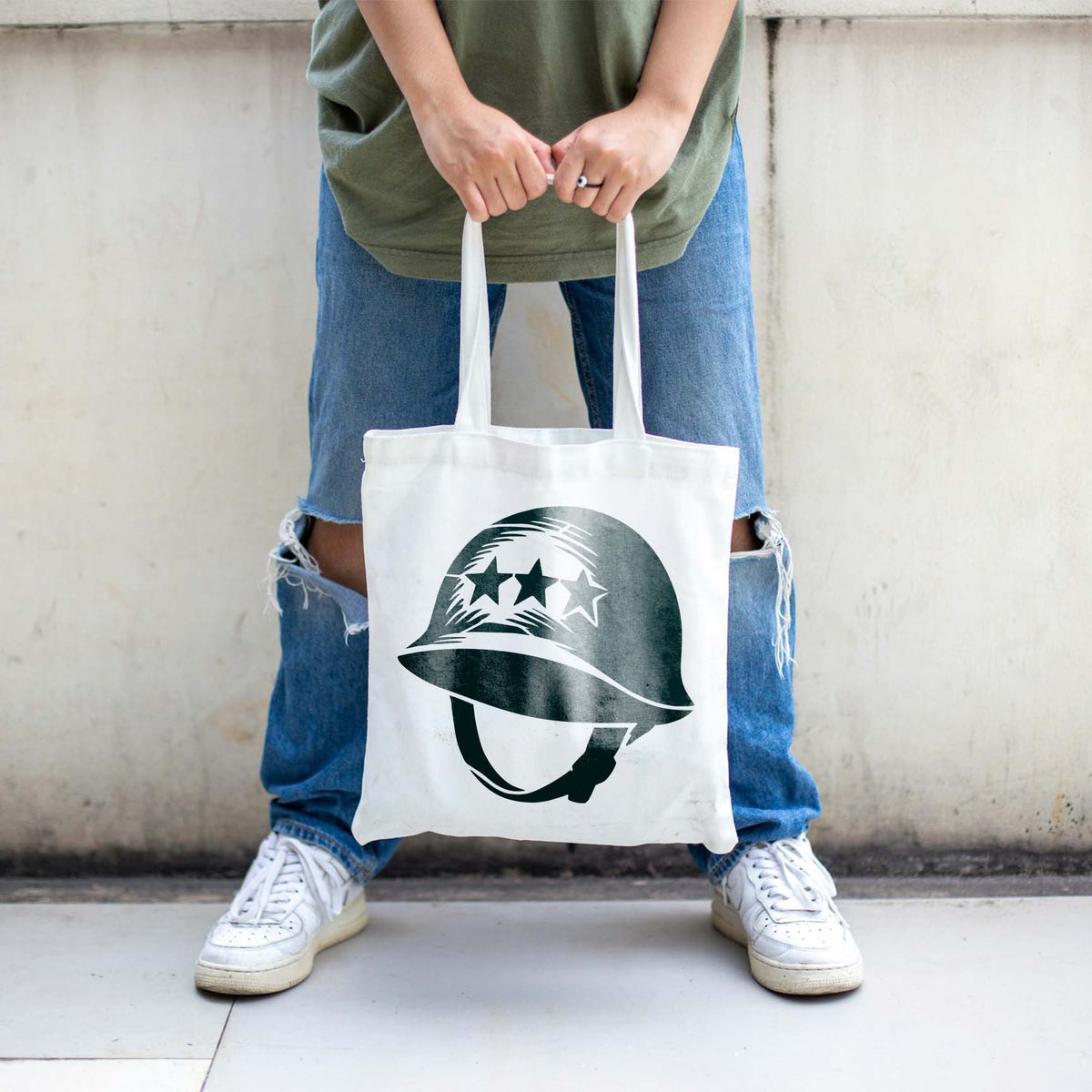 Military Combat Helmet Stencil with three stars printed on a white tote bag.
