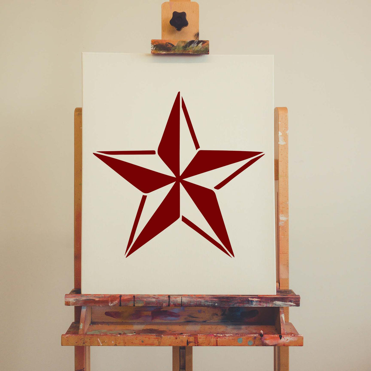 Nautical Star Stencil painted in deep red on a white artist canvas