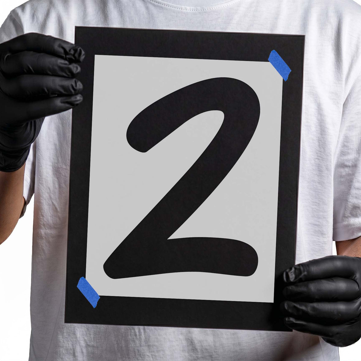 Number 2 stencil featuring a bold numeral with sweeping curves and rounded strokes