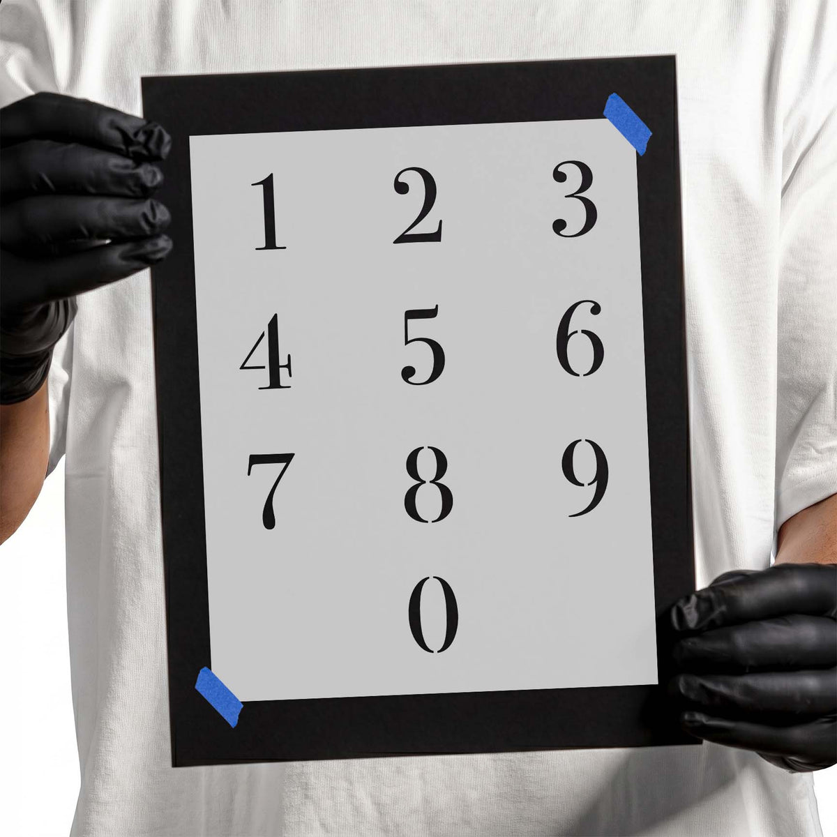 Numbers stencil featuring digits zero through nine in elegant serif lettering arranged in rows