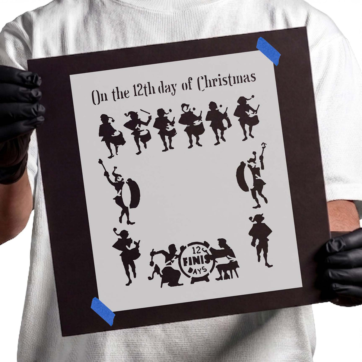 Twelve drummers arranged in a circular Christmas stencil design