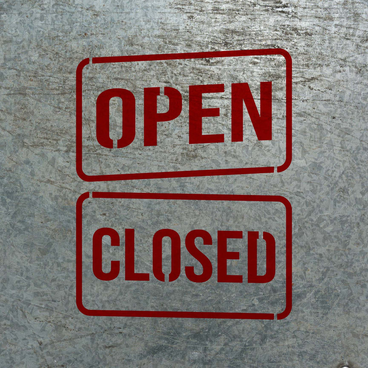 Crisp Open & Closed Sign Stencil lettering painted red across a weathered metal surface