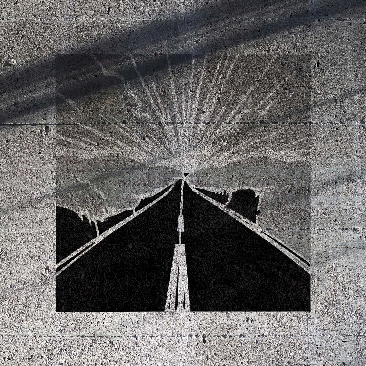 Open Road Sunrise Landscape Stencil shows a highway beneath radiant sunrise rays on concrete