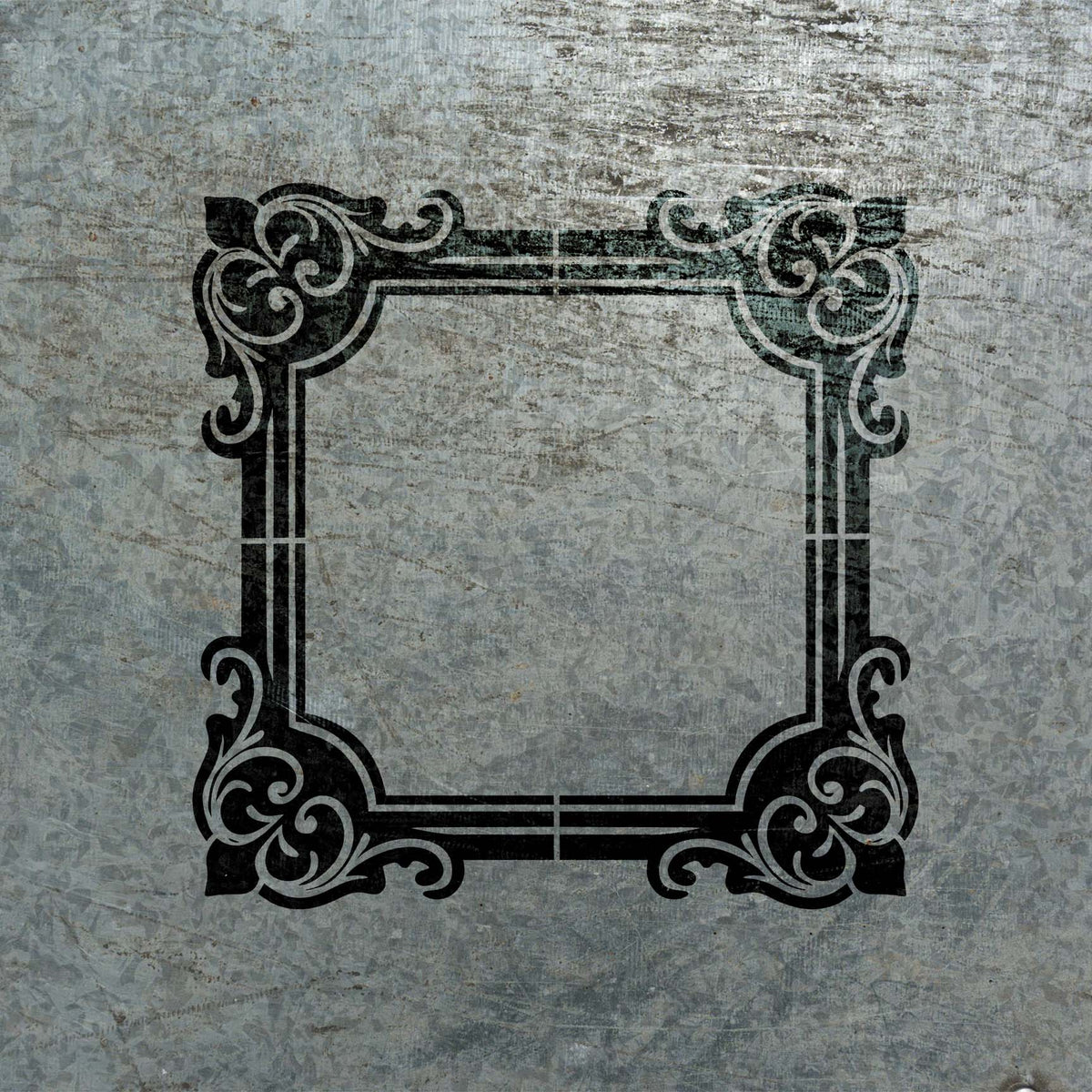 Black Ornate Corner Border Frame Stencil with decorative flourishes painted across textured metal