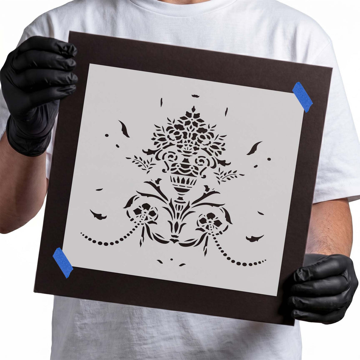 Ornate Flower Vase Stencil featuring intricate blossoms, curling vines, and dotted floral garlands