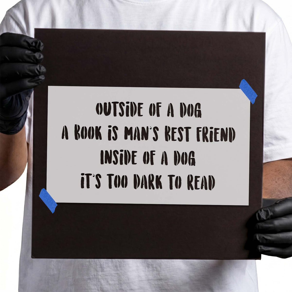 Playful Outside of a Dog Stencil featuring a humorous book and dog saying in bold distressed lettering