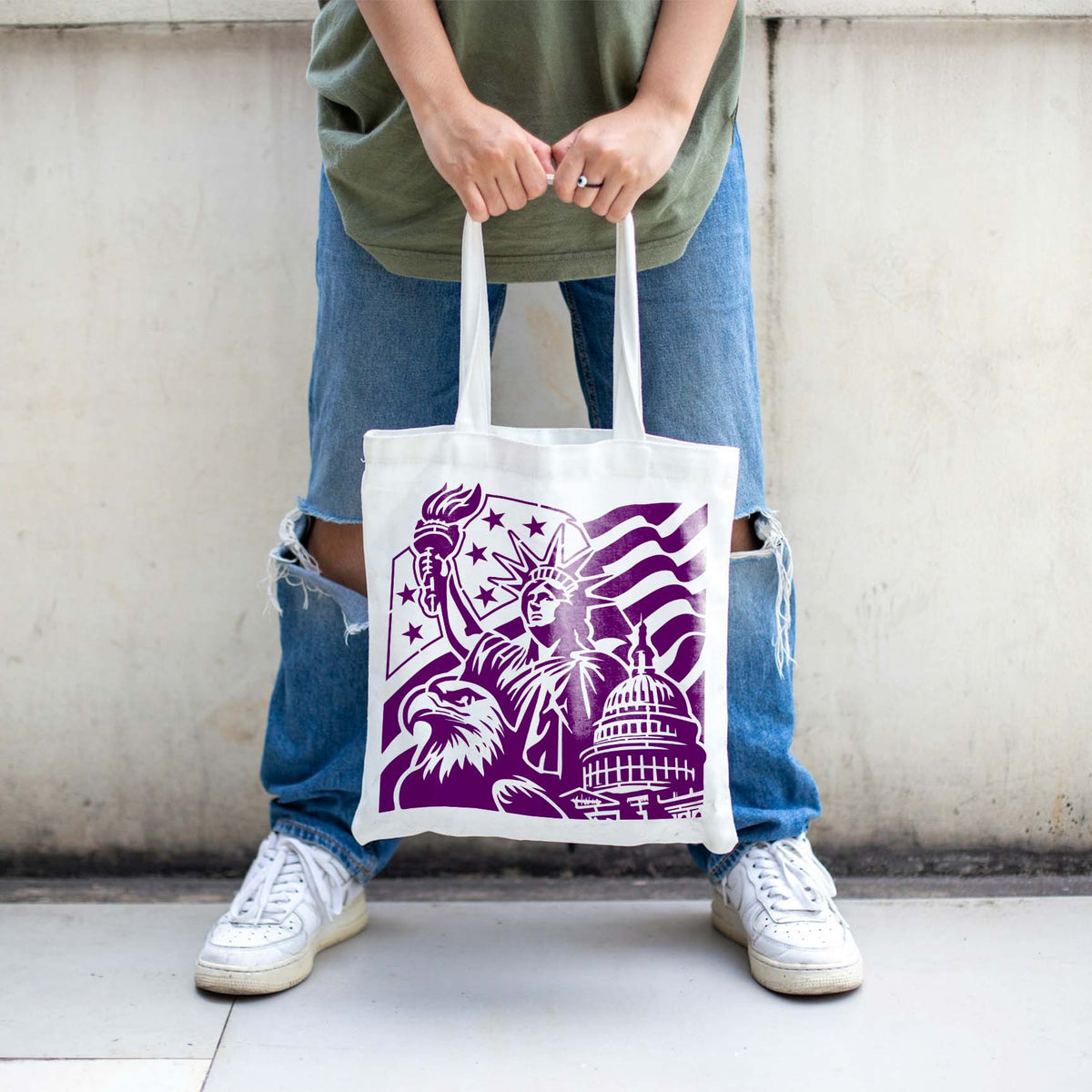 A tote bag displays the Patriotic American Landmarks Stencil with Liberty, eagle, flag, and Capitol.