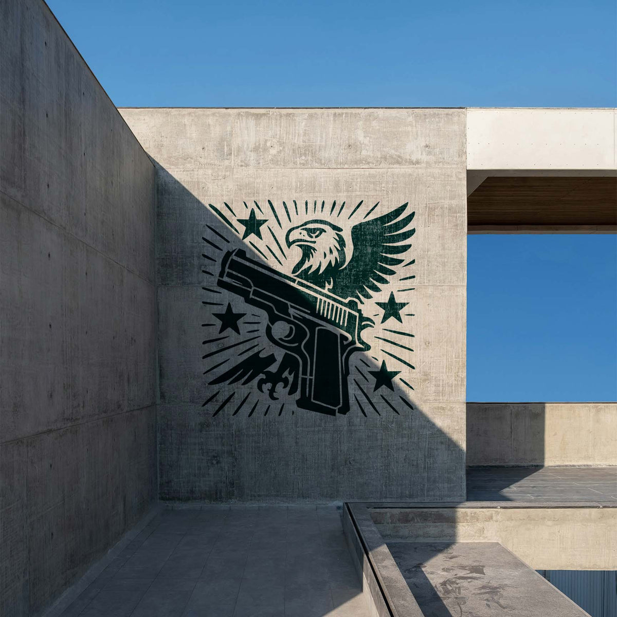 Bold Patriotic Eagle and Handgun Stencil decorates a concrete wall with eagle, pistol, and stars.