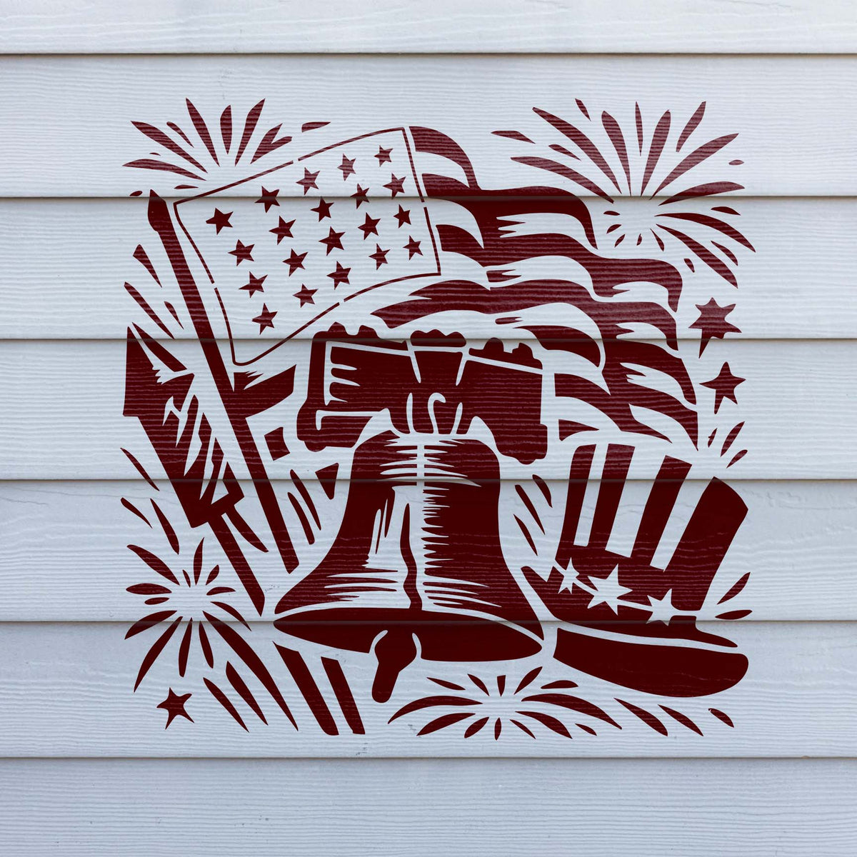 Red Patriotic Liberty Bell Celebration Stencil painted on white siding with festive icons