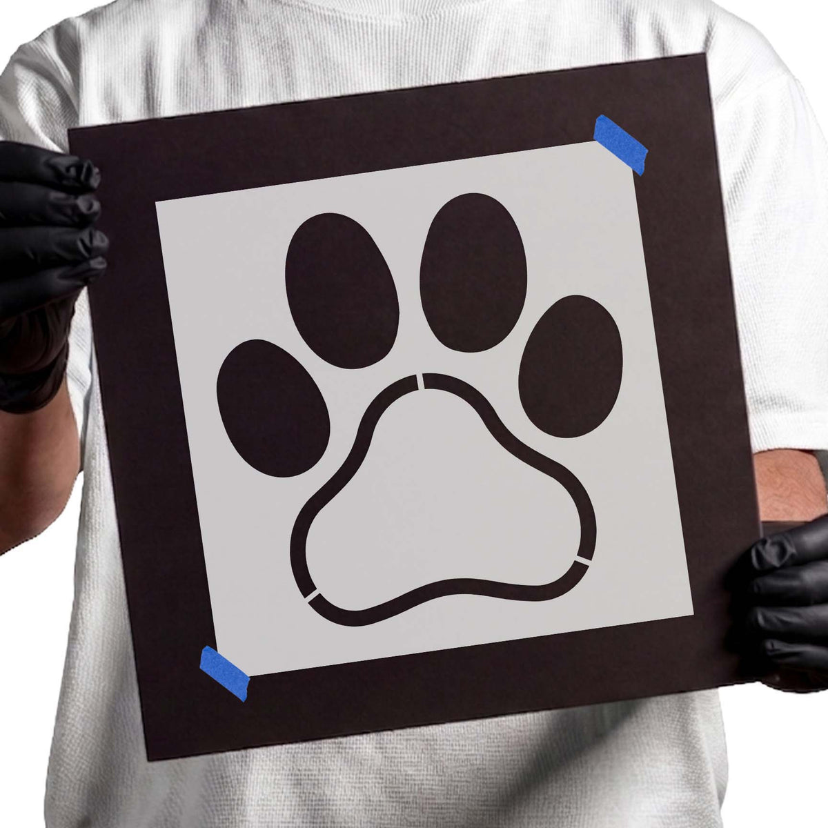 Paw print stencil with four rounded toes and an open center frame