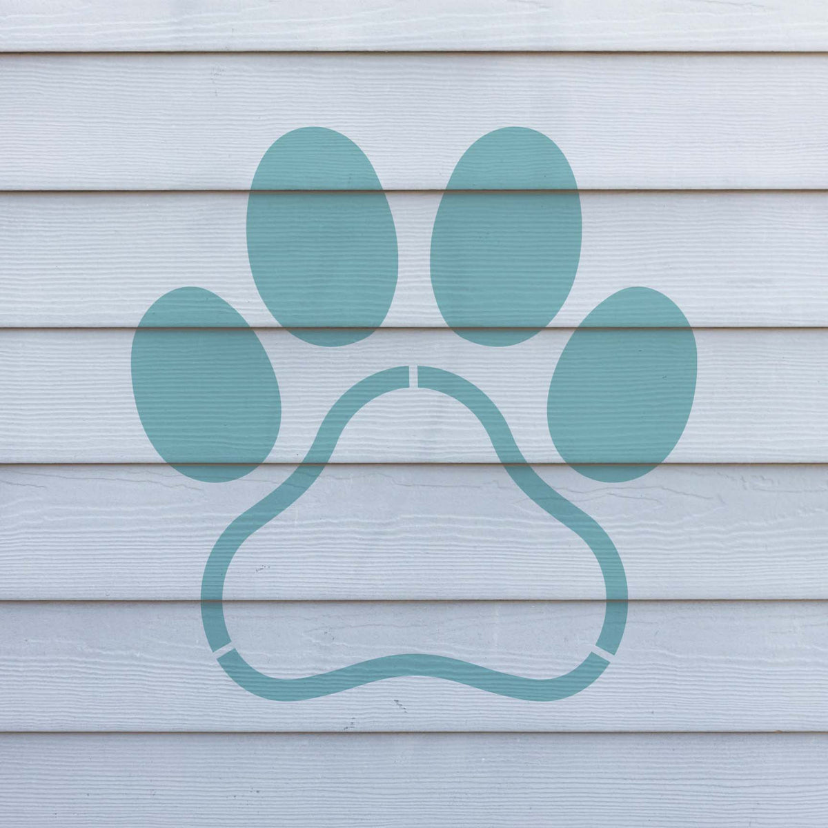 Pale blue Paw Print Frame Stencil creates an oversized outlined paw across white wall siding