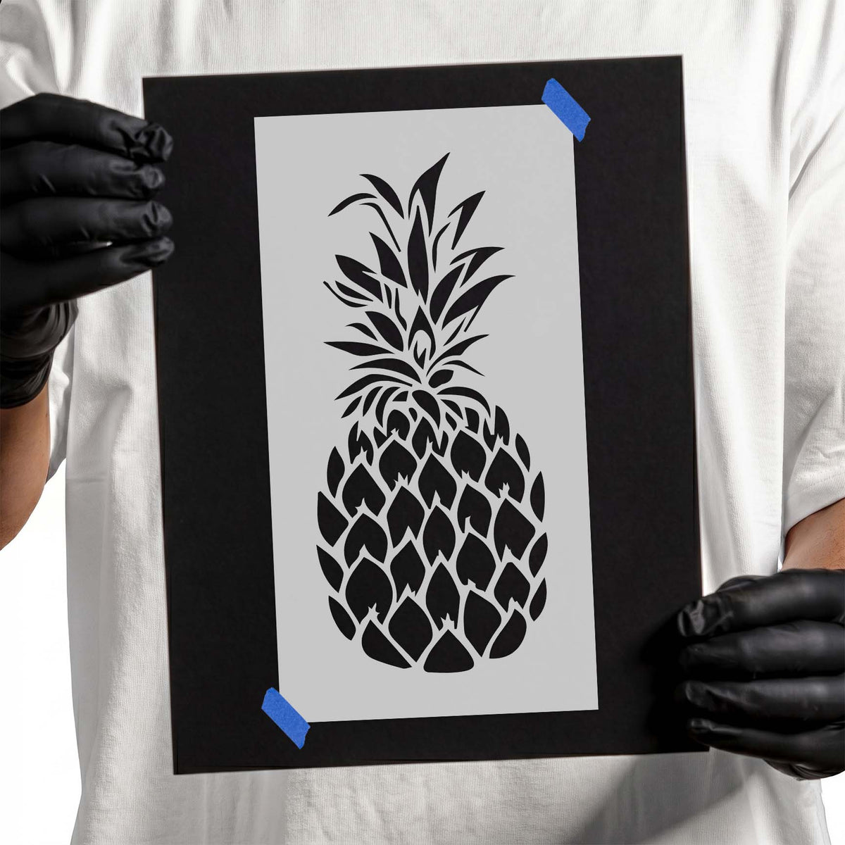 Pineapple stencil with pointed leaves and textured fruit pattern