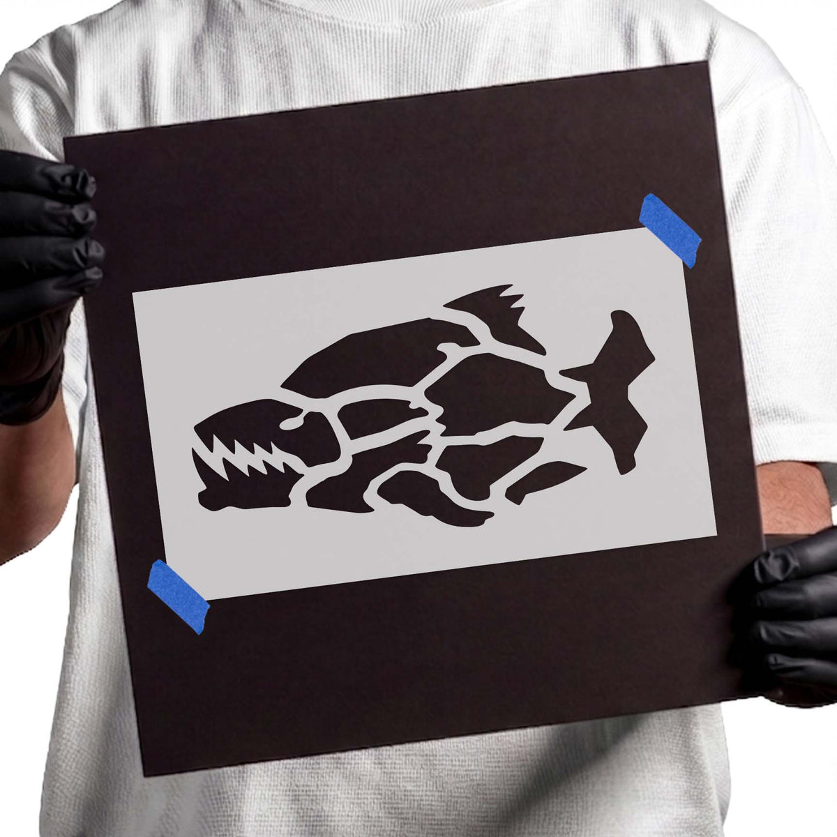 Piranha stencil with jagged teeth and abstract segmented fish silhouette