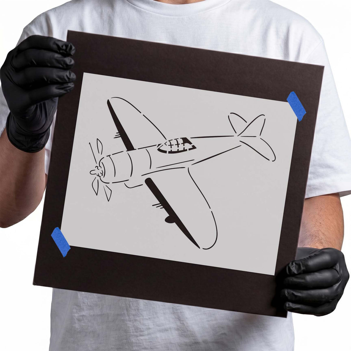 Propeller plane stencil with broad wings, cockpit, and streamlined tail