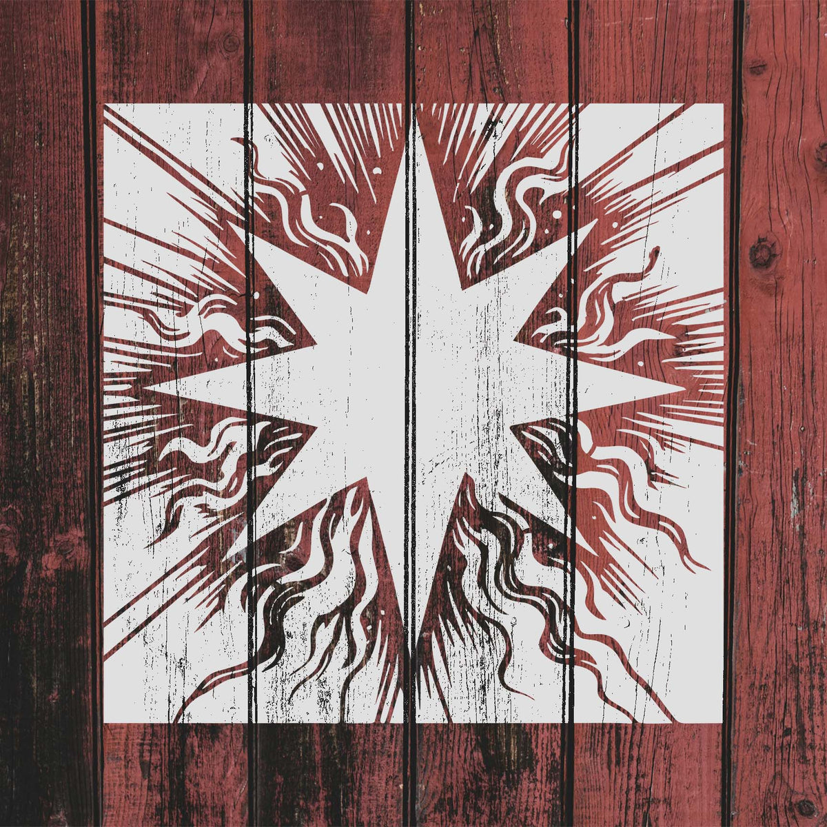 White Radiant Eight-Point Star Stencil spreads sharp rays and swirling flames across rustic red wood.