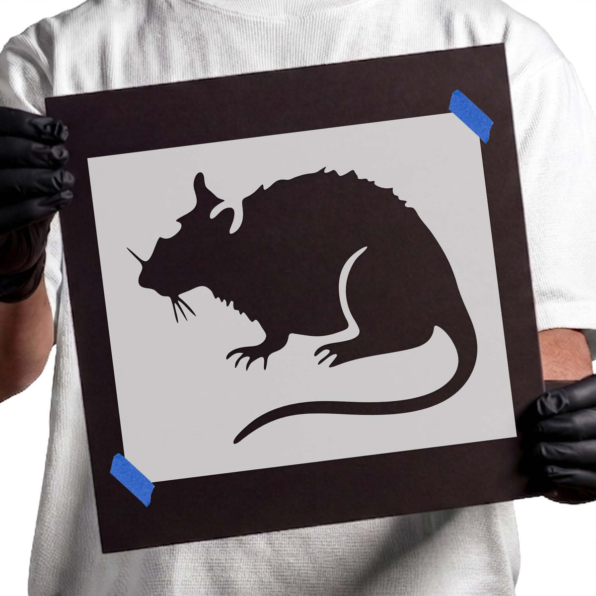 Crouching rat stencil with textured back, pointed whiskers, clawed feet, and long curling tail