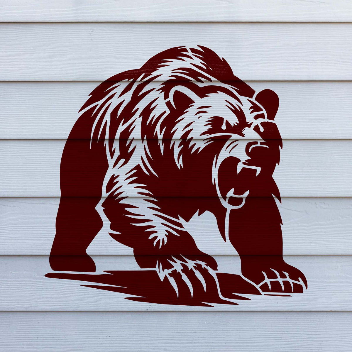 Fierce Roaring Grizzly Bear Stencil displays detailed fur and claws on white siding