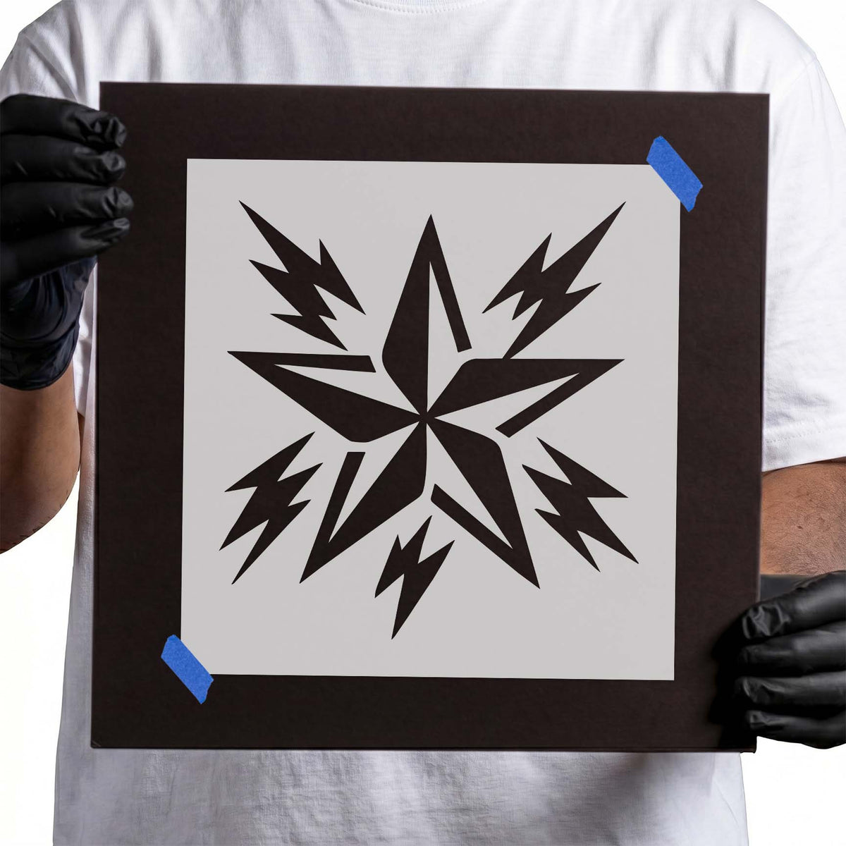 Geometric star stencil surrounded by sharp radiating lightning bolts
