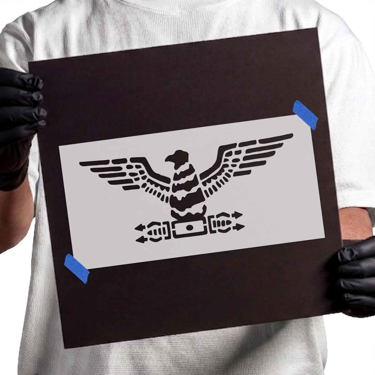 Roman legionary eagle stencil with outstretched wings and symmetrical decorative emblem
