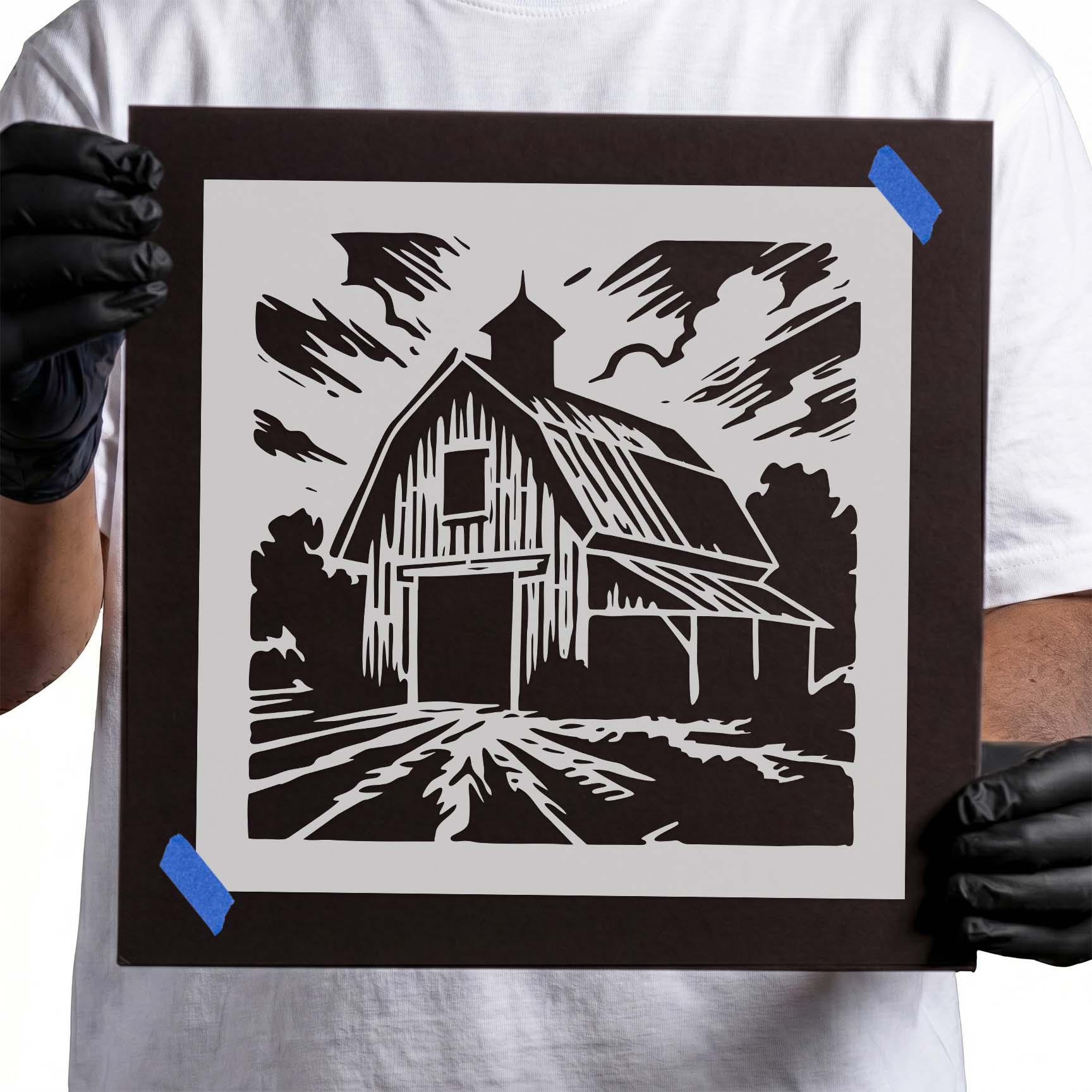 Country barn stencil with cupola, open doorway, trees and rural landscape

