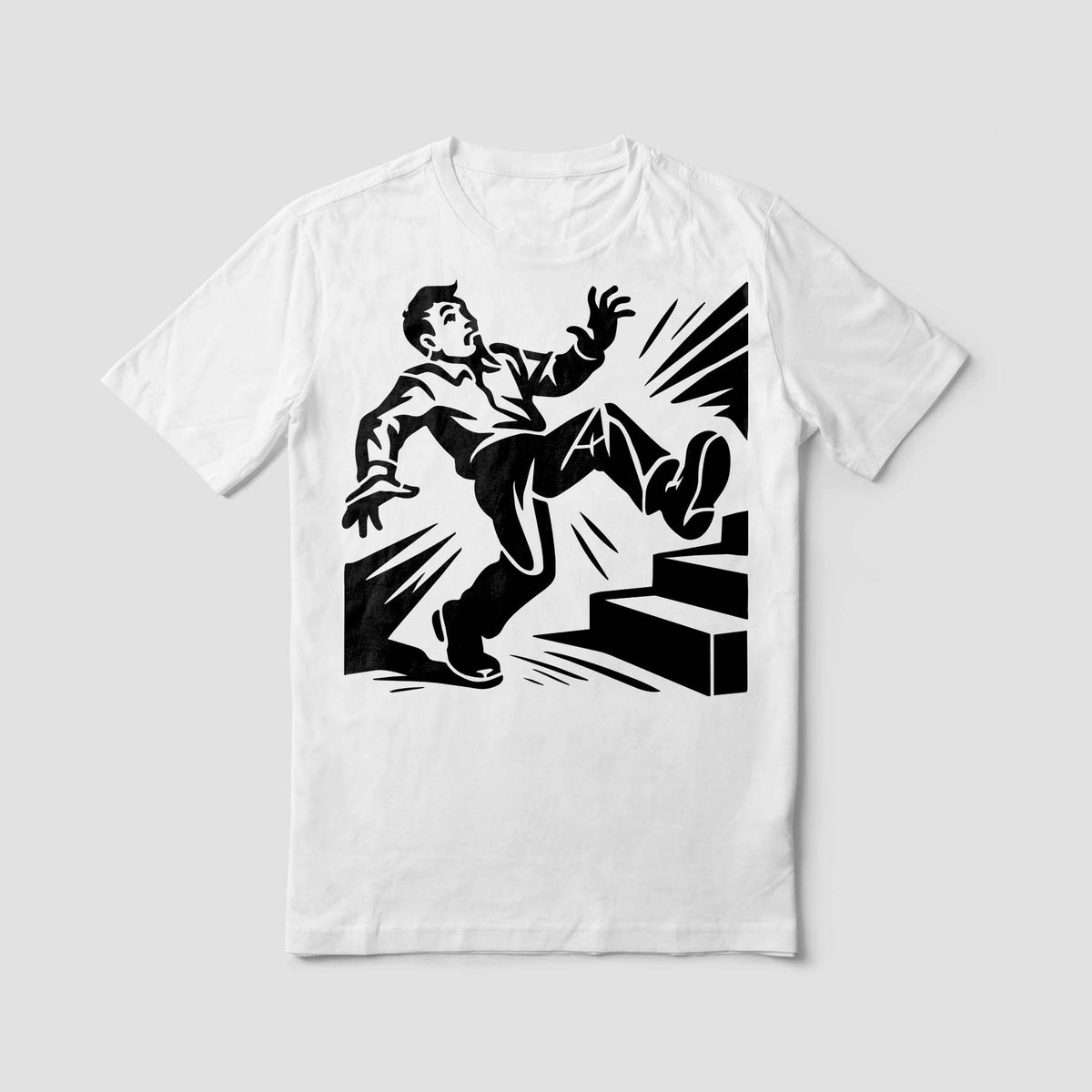 A white T-shirt features the Slip Hazard Stencil with a bold figure losing balance beside stairs.