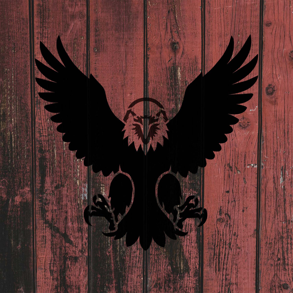 Dramatic Soaring Eagle Front View Stencil spreads across weathered red wooden planks with curved claws.