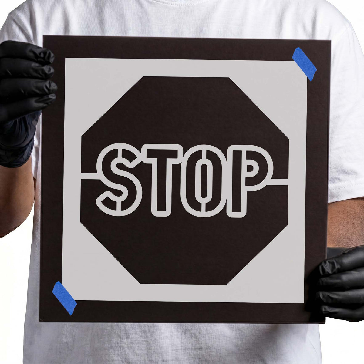 Stop Sign Inverse Stencil showing an octagonal silhouette with bold outlined STOP lettering