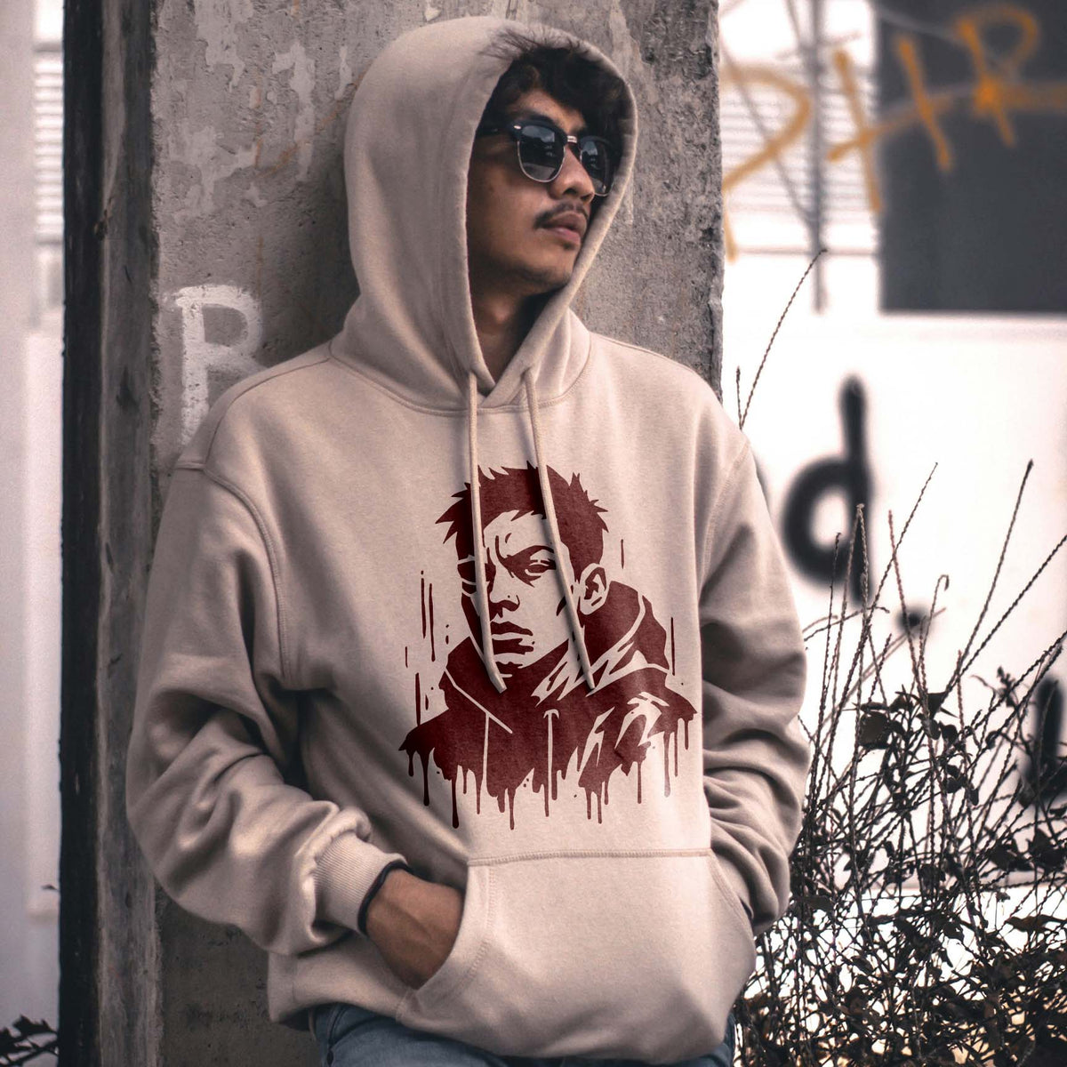 A burgundy Street Style Portrait Stencil adds a dripping urban portrait to a beige hoodie.